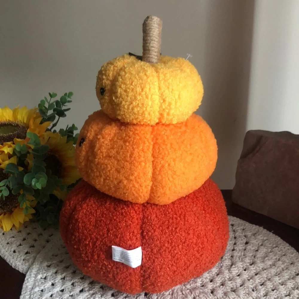 Stacked SHERPA Pumpkins with Smiley Faces